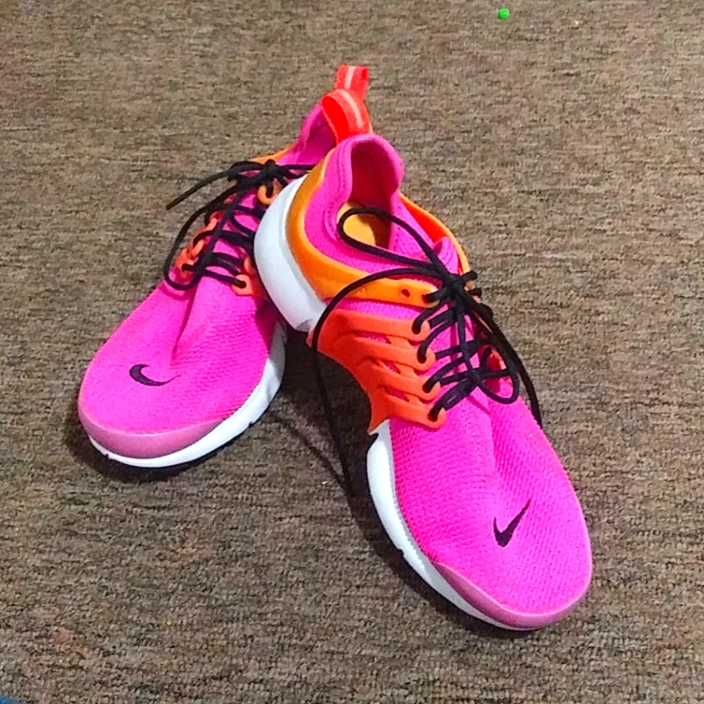 Pink and orange Nike airs